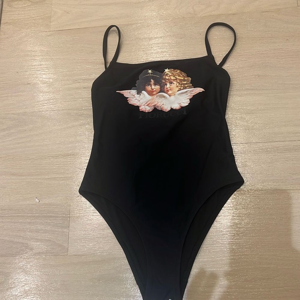 Brand new black fiorucci one piece bathing suit. Never worn. No stains